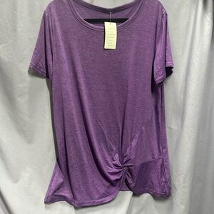 New with tags purple 14W soft tee shirt with a twist at bottom hem